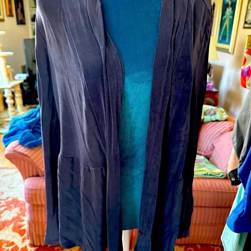 Coldwater Creek traveling type top. Silky flirty little flounce at bottom size M